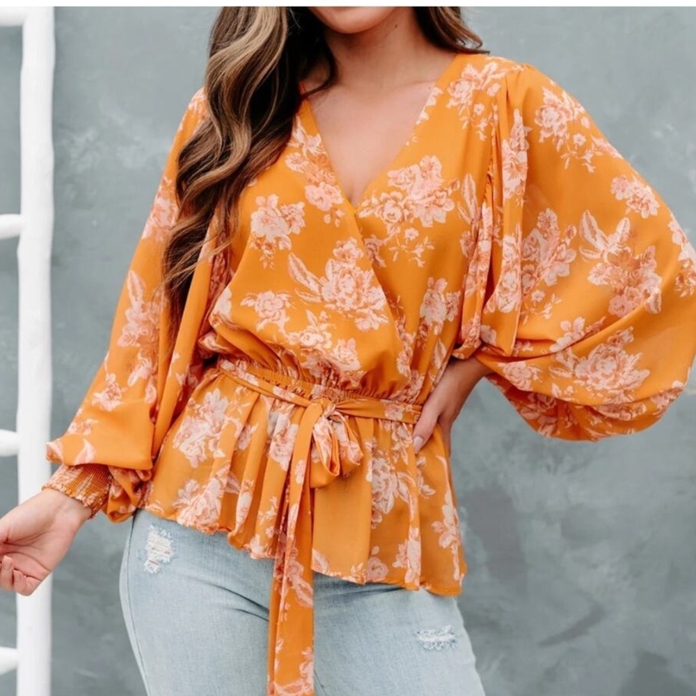 Love Colette peplum blouse with surplice neckline and floral print Size Large